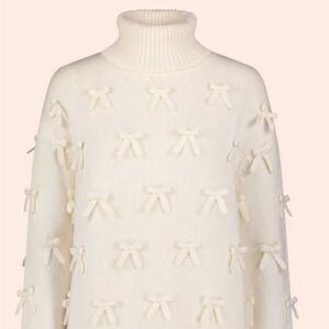Pearl by Lela Rose. Elegant Cream Sweater with Bow Details